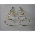 Many sizes of metal glasses for dolls